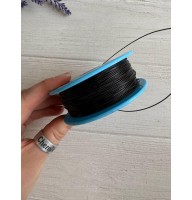 Волосінь ( мононитка)  " Marill "  0,7 мм , чорна  100 м  ( фарбує руки)