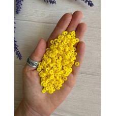 Бусины  плоские 6 мм каучук , желтые    500 грам