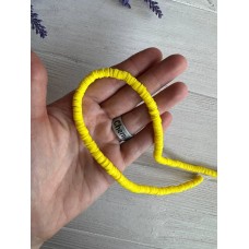 Нитка намистини  плоскі 6 мм каучук, жовті 40 см