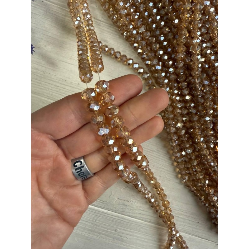 Намистини " Рондель 8 мм " кришталь  , карамельні АВ  нитка 60 - 67  шт