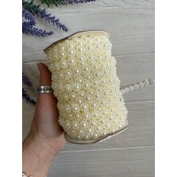 Серединка на нитці " Квіточка "  бежева 25 ярдів