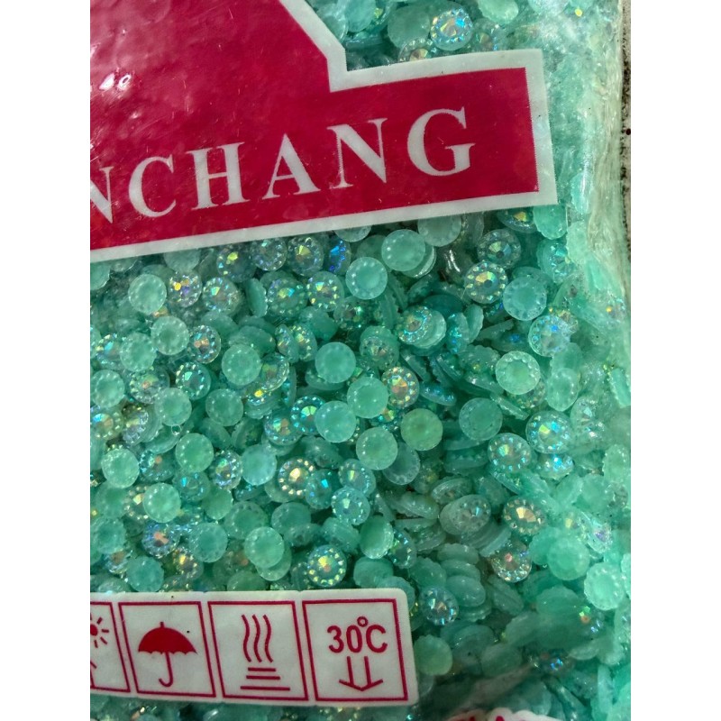 Стрази АВ непрозорі " Квітка " 5 мм бірюза 30 000 шт