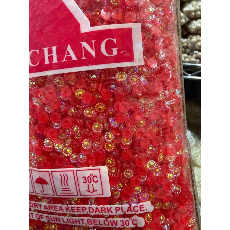 Стрази АВ непрозорі " Квітка " 5 мм червоні 30 000 шт