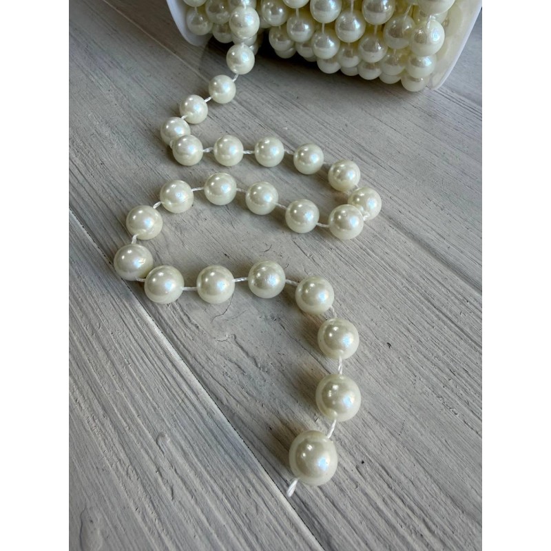 Намистини на нитці " 12 мм " бежевий котушка 7 метрів