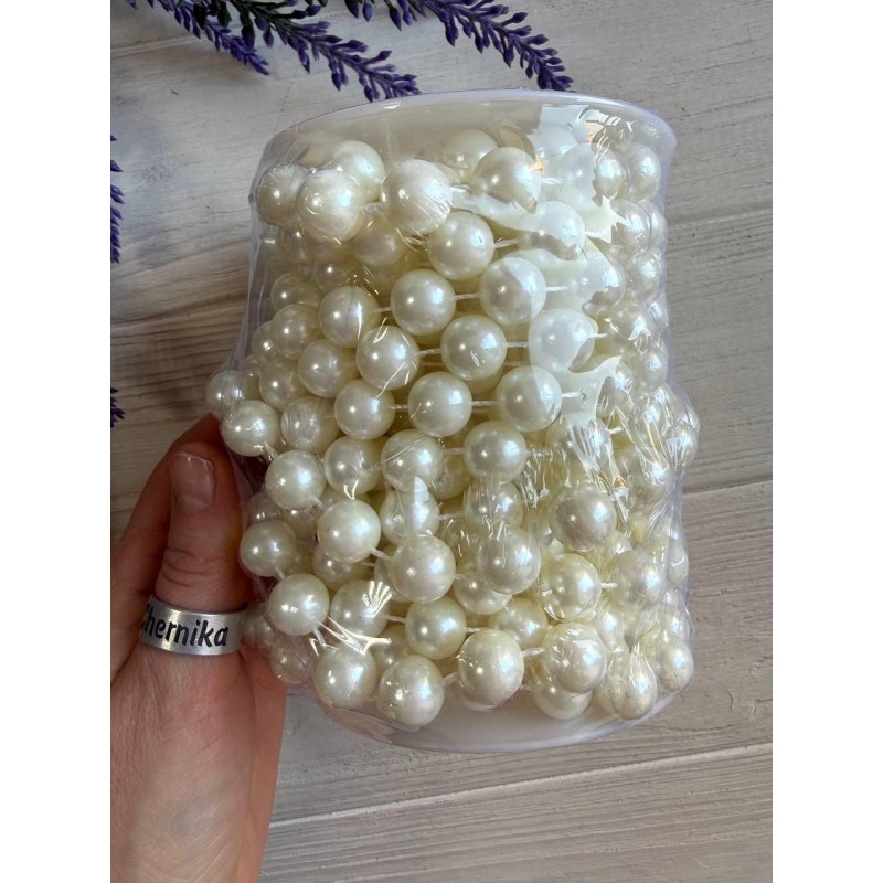 Намистини на нитці " 12 мм " бежевий котушка 7 метрів